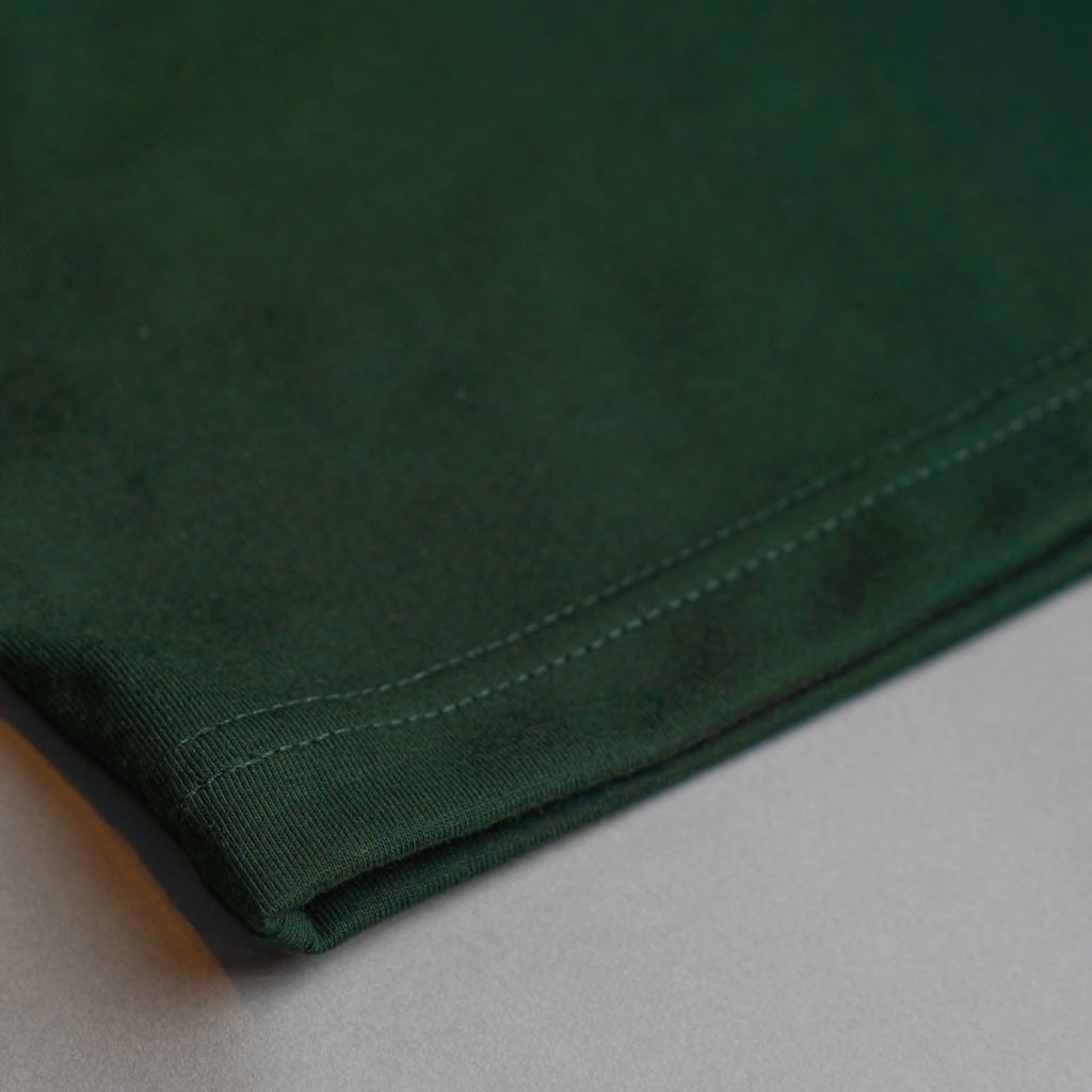 PRO TEAM POLO IN FOREST GREEN
