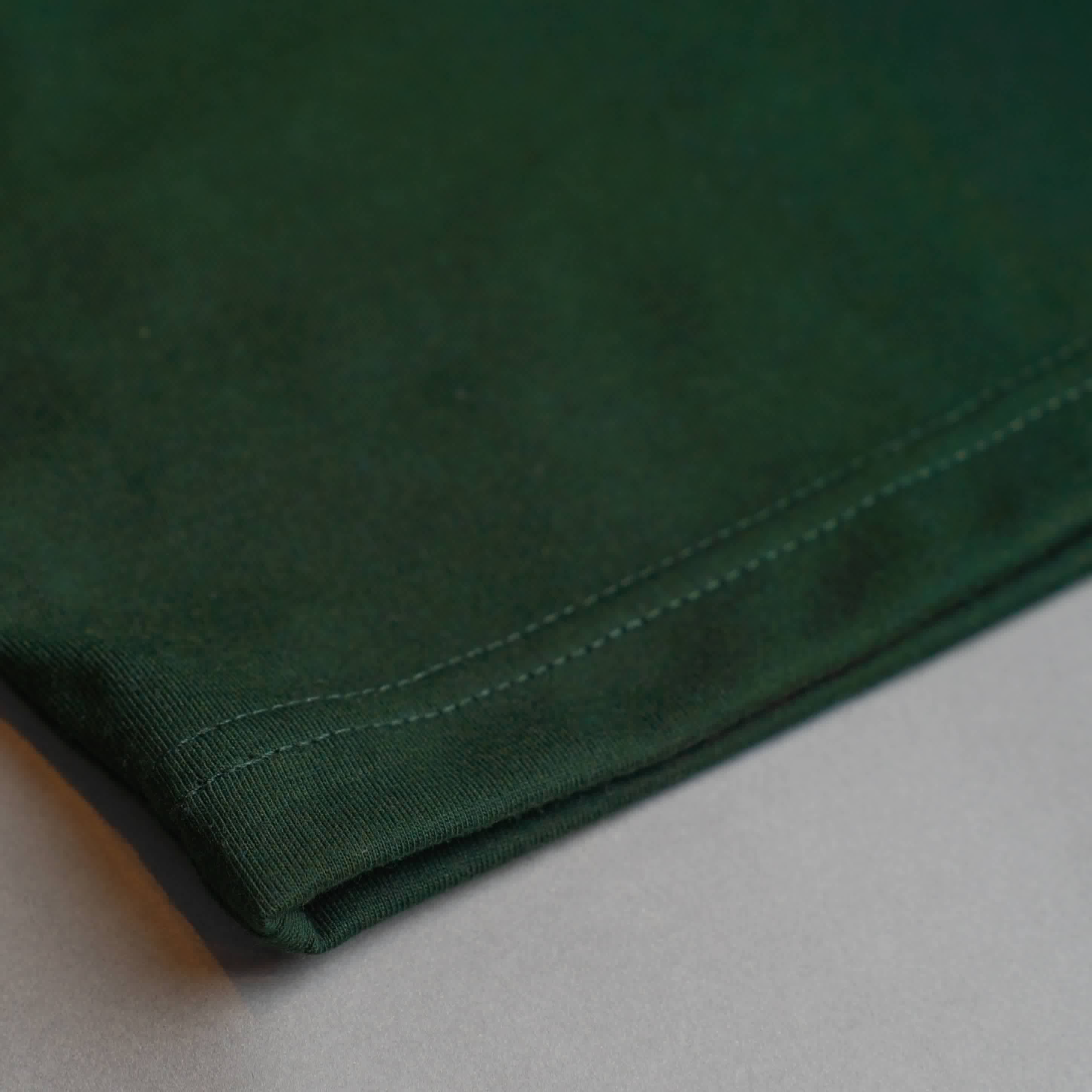 PRO TEAM POLO IN FOREST GREEN