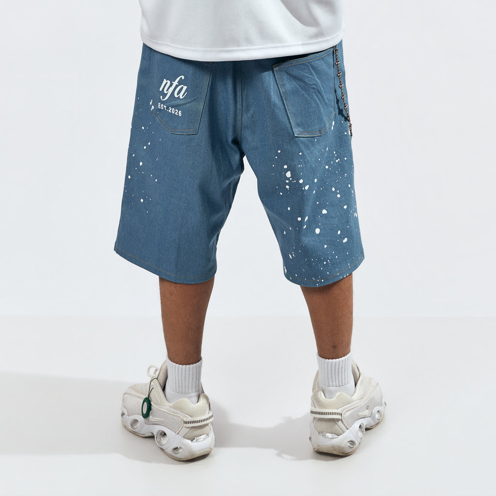 DENIM JORTS IN WASHED BLUE